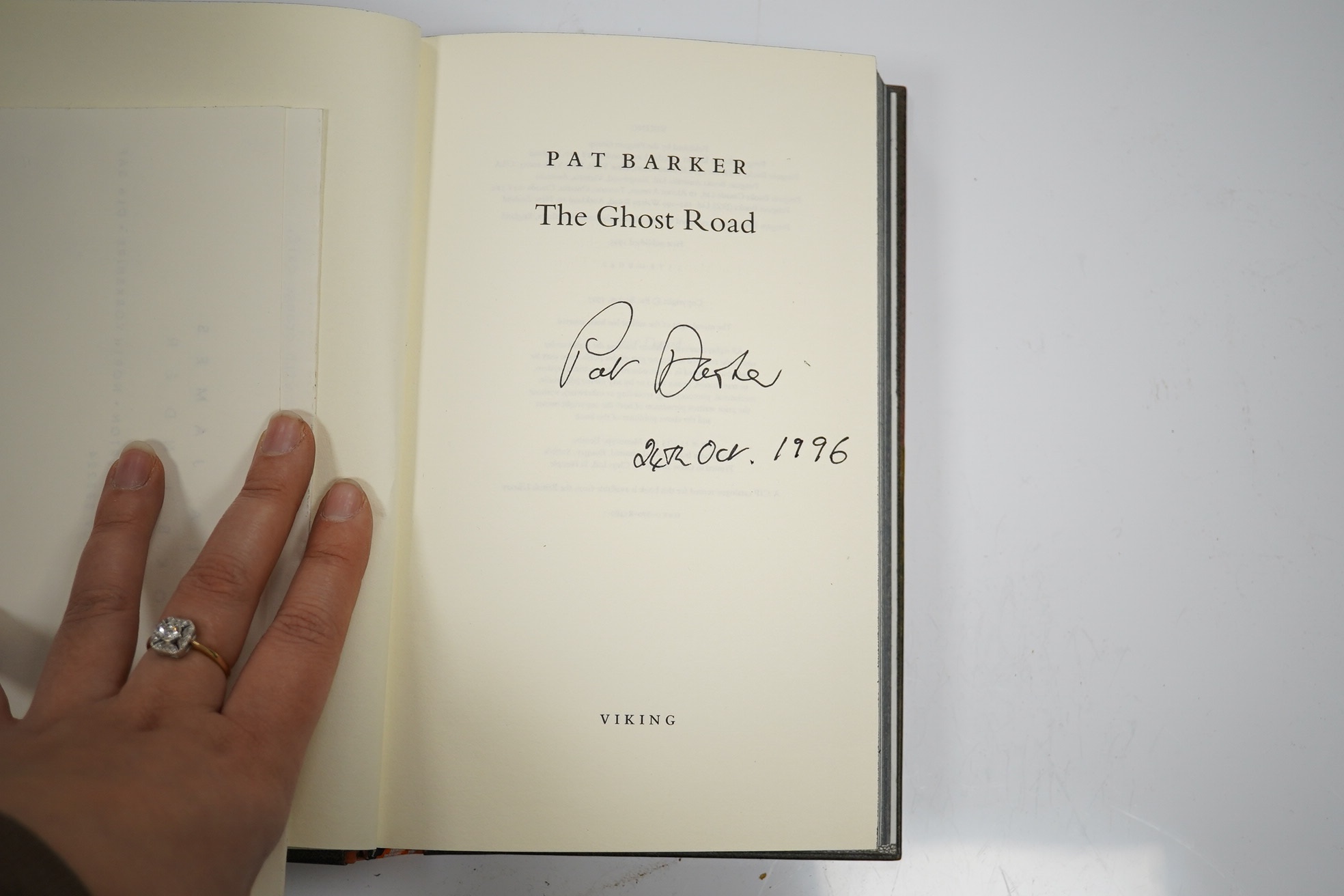 Fine binding - Barker, Pat - The Ghost Road, signed by the author, dated 24th Oct. 1996, in a fine binding by Angela James, including the front cover inlaid with bone, shell and fossil found on Saltburn Beach. Viking, 19